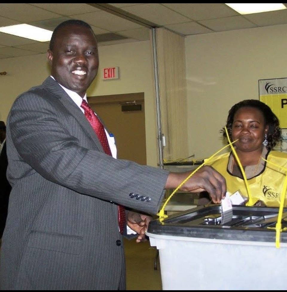 A South Sudanese diaspora voter casts a ballot during the 2011 referendum