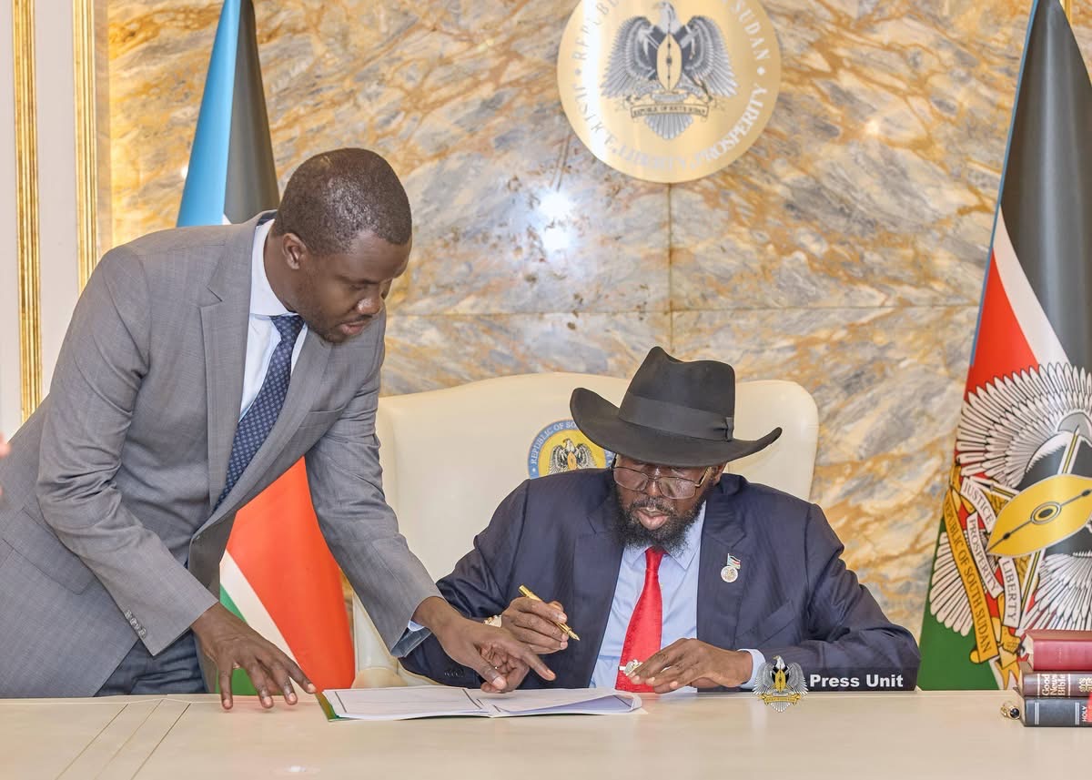President Salva Kiir signing official documents in Juba