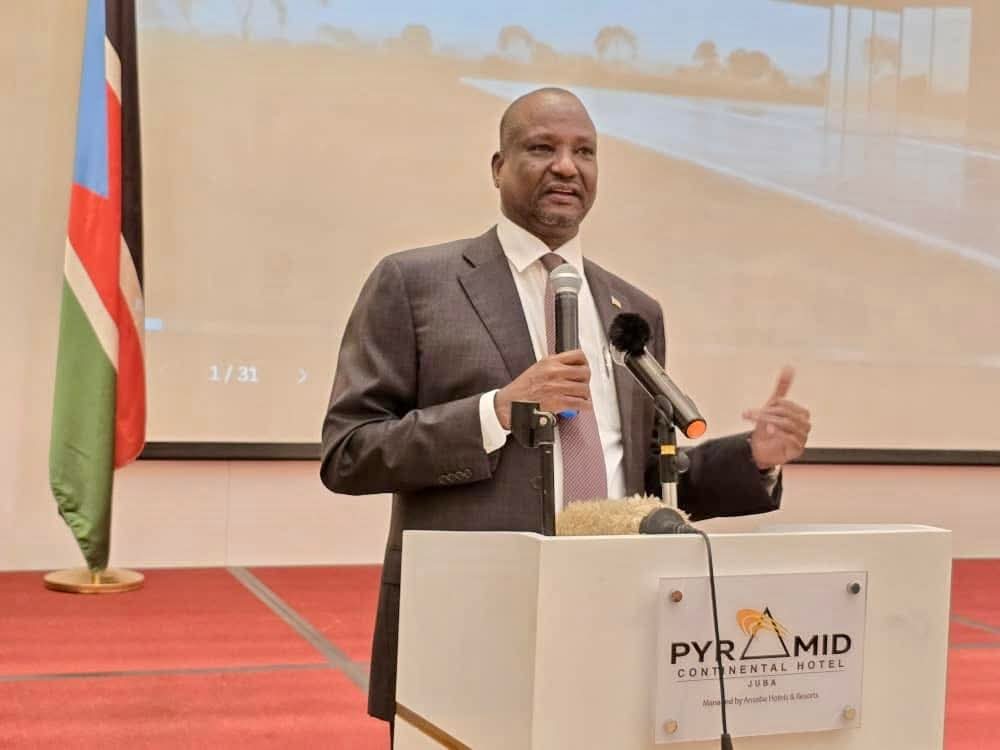 Vice President Taban Deng Gai speaking at a podium in Juba