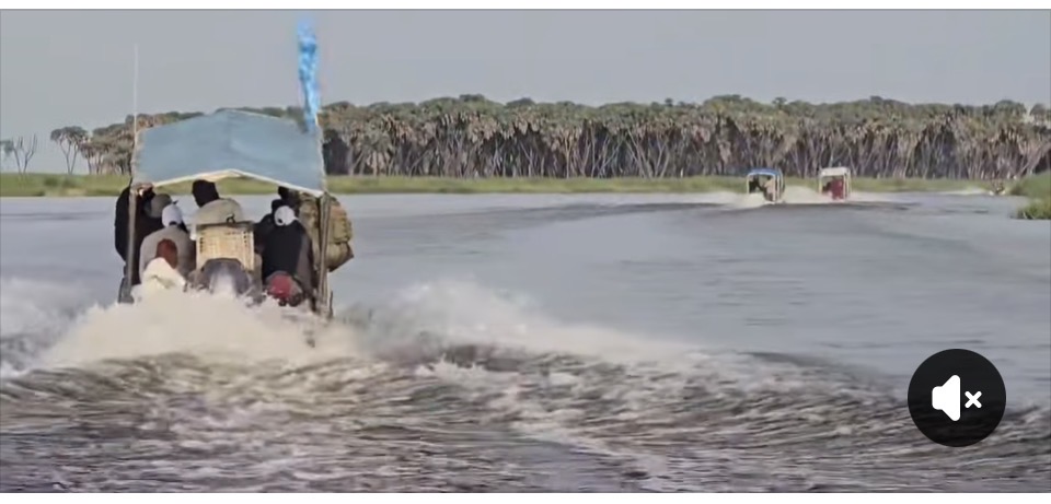 Boats moving along a river route in Upper Nile