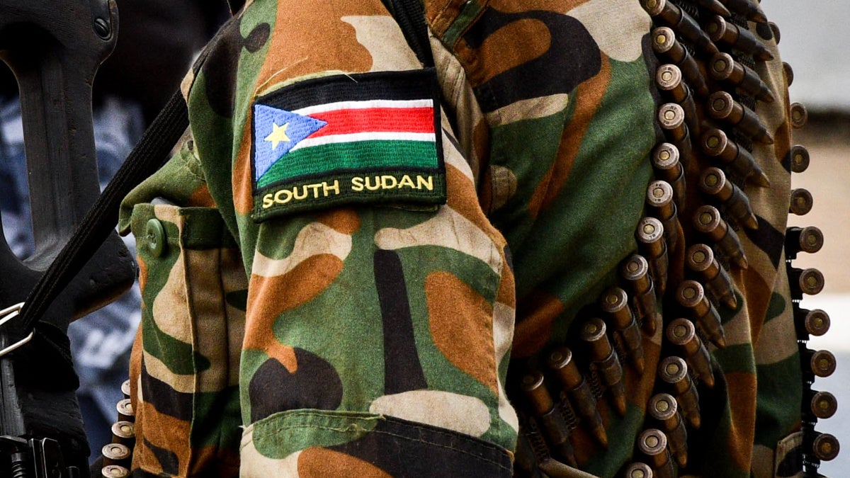 Illustrative South Sudan military uniform detail; not a photograph of the Wunkur incident